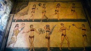 a) Le palestrite in due pezzi raffigurate nel celebre mosaico di Piazza Armerina